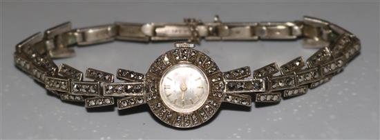 A ladys 1960s Art Deco style silver and marcasite set manual wind wrist watch.